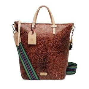 Sally Sling is like new and never been used. It can be worn three ways.
